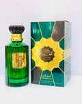 Emerald Eau de Parfum bottle and its retail box. The bottle is made of translucent green glass with a black ribbed cap and a gold label.